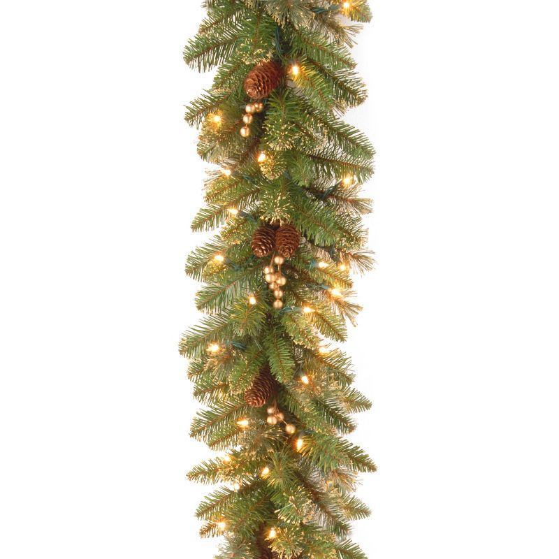 The Holiday Aisle® 9ft. Glittery Gold Pine Garland with Clear Lights