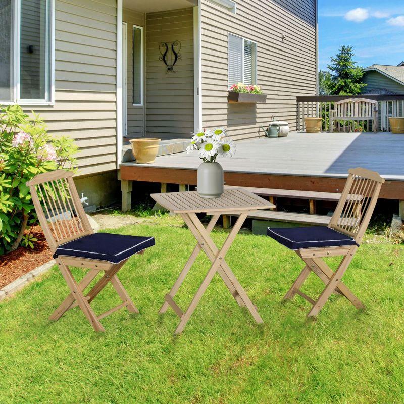 Outsunny 3 Pieces Patio Folding Bistro Set, Outdoor Pine Wood Table and Chairs Set with Tie-on Cushion & Square Coffee Table, Dark Blue