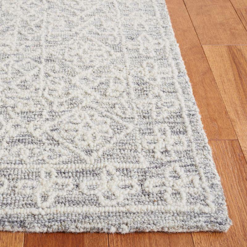 Gray and Ivory Hand Tufted Wool Area Rug 6' x 9'