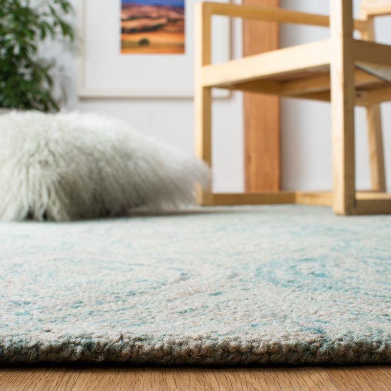 Coastal Breeze Ivory and Sea Blue Hand-Tufted Wool Round Rug