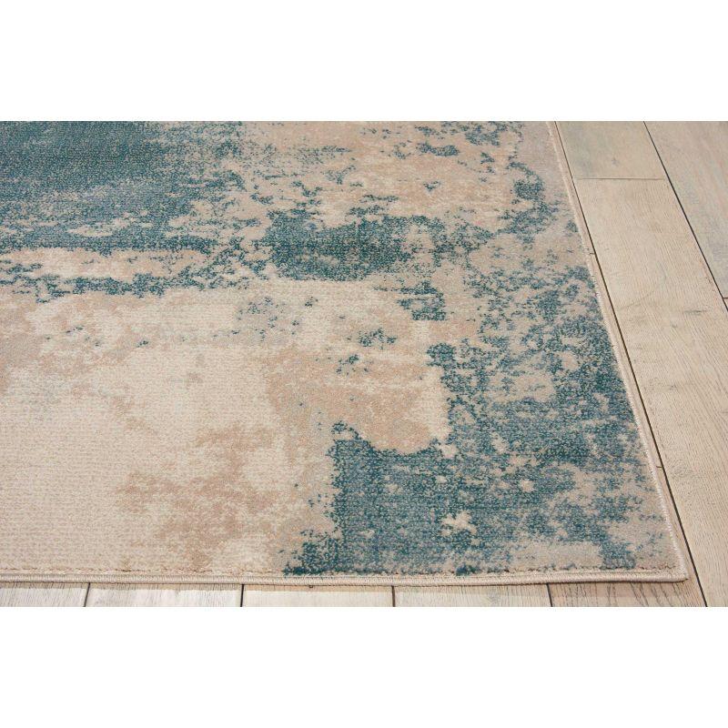 Maxell Ivory/Teal Synthetic 9'3"x12'9" Easy Care Area Rug