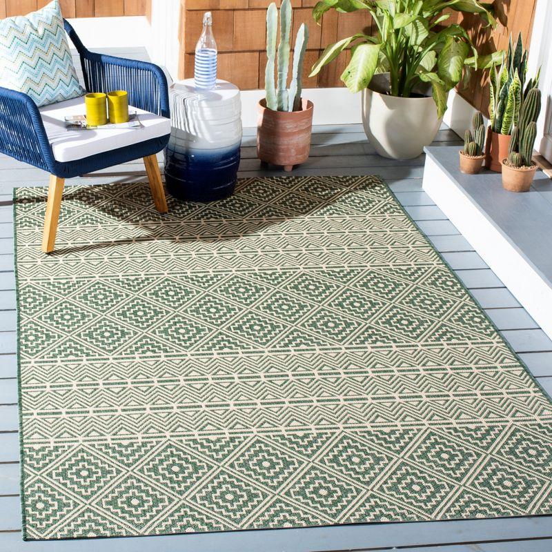 Dark Green and Beige Geometric Indoor/Outdoor Area Rug 4' x 5'7"