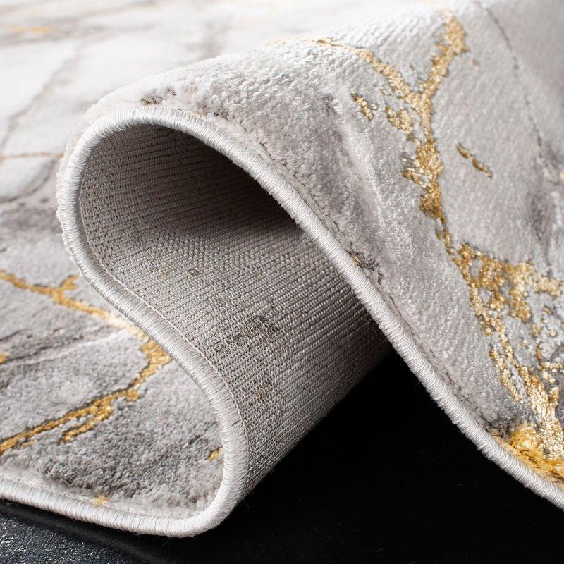 Abstract Swirls Grey and Gold 9' x 12' Synthetic Reversible Rug