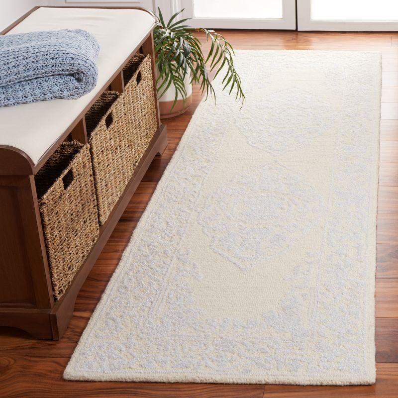 Ivory Abstract Handmade Wool 4' x 6' Tufted Rug