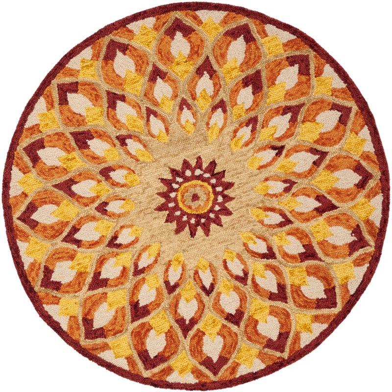 Novelty NOV603 Hand Tufted Area Rug - Rust/Gold - 3' round - Safavieh.