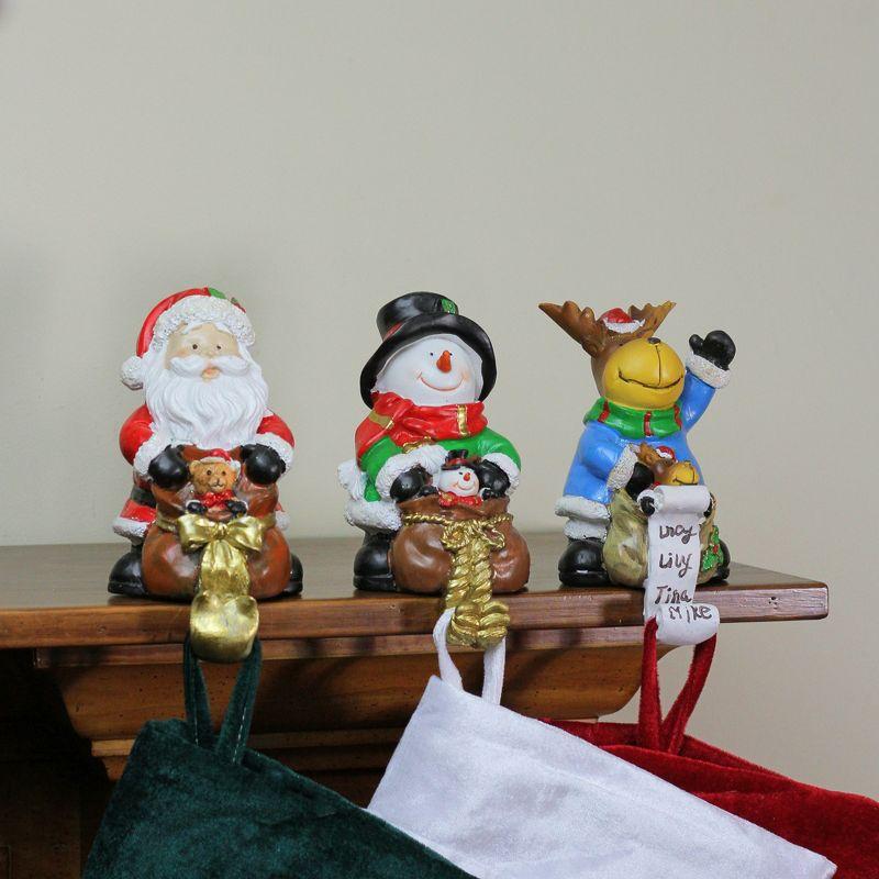 Festive Santa, Snowman, and Reindeer Christmas Stocking Holders Set