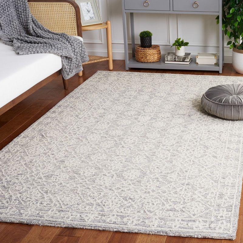 Gray and Ivory Hand Tufted Wool Area Rug 6' x 9'