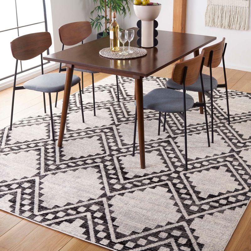 Black/Ivory Geometric 8' x 10' Easy-Care Synthetic Area Rug