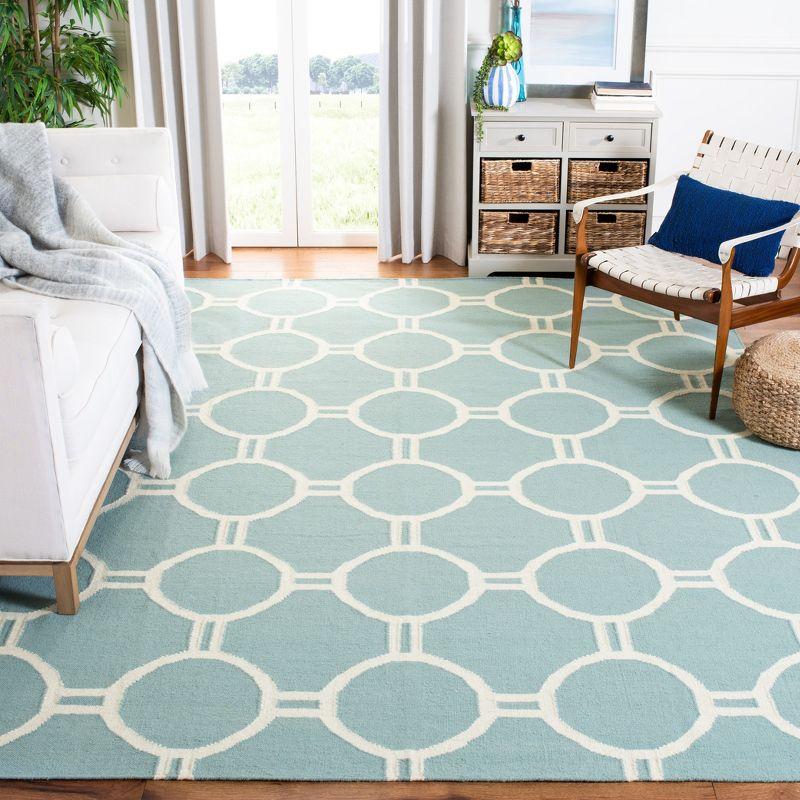 Handmade Light Blue and Ivory Wool Geometric Area Rug