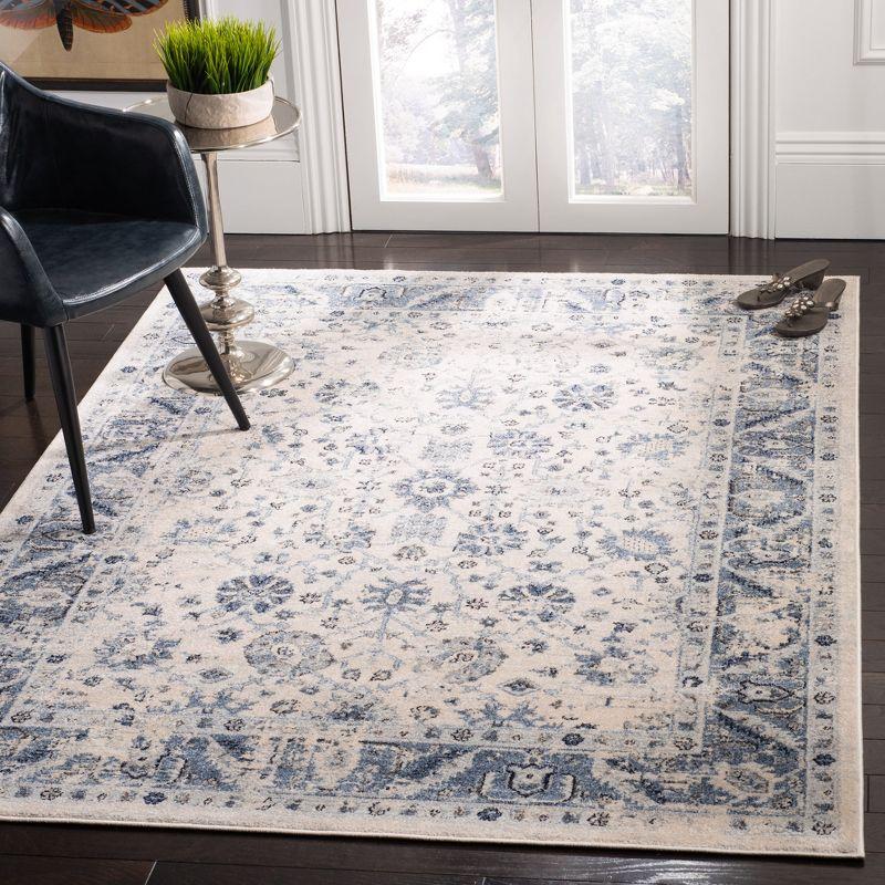 Charleston Heirloom Ivory and Blue Synthetic 6' x 9' Area Rug