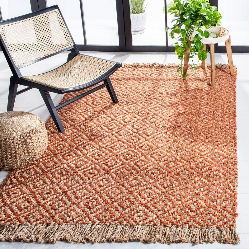 Handmade Orange and Natural Jute Area Rug 4' x 6'