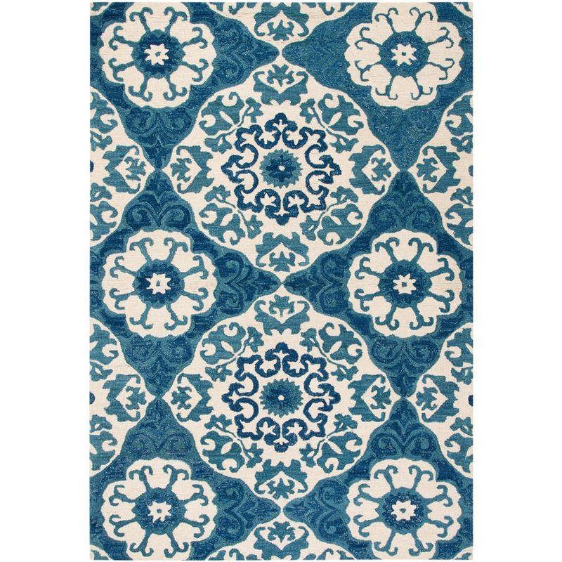 Roslyn ROS525 Hand Tufted Area Rug - Blue/Ivory - 6'x9' - Safavieh.