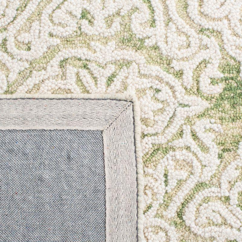 Handmade Light Green and Ivory Floral Wool Rug, 6' x 9'