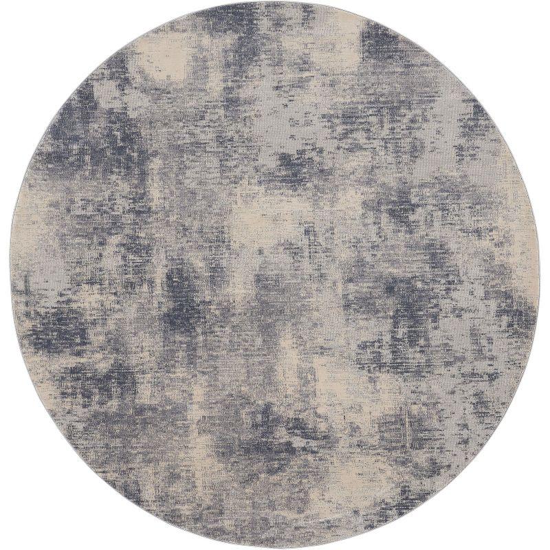 Round Blue and Ivory Abstract Area Rug 7'10"