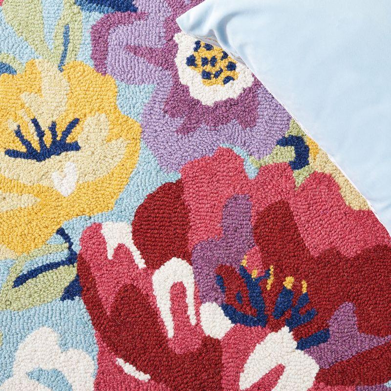 Chelsea HK219 Hand Tufted Area Rug - Blue/Rose - 6'x9' Oval - Safavieh.