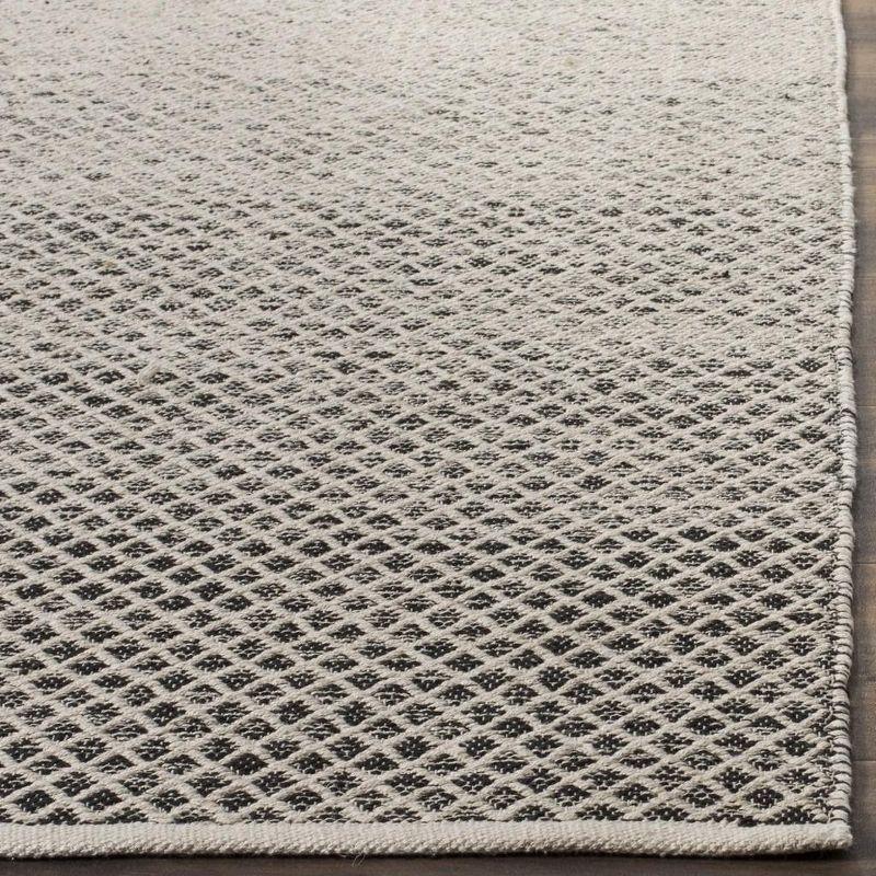 Montauk MTK601 Hand Woven Indoor Area Rug - Black/Ivory - 6'x9' - Safavieh.