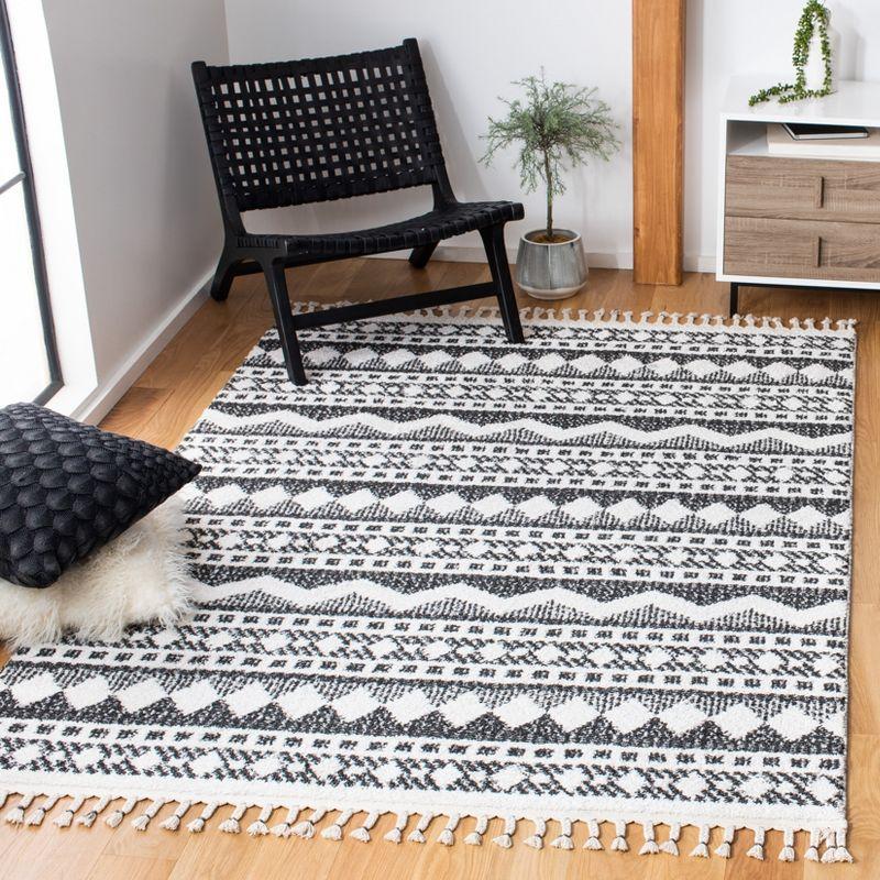 Ivory and Black Braided Diamond Shag Rectangular Rug