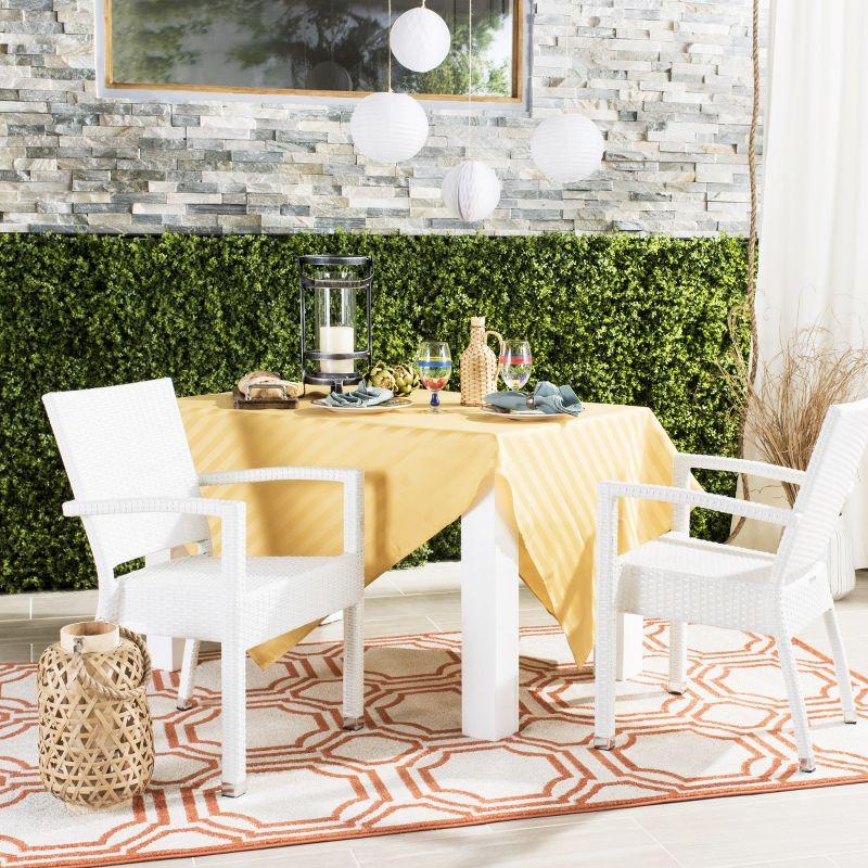 Kelda Stackable Arm Chair Indoor/Outdoor (Set Of 2) - PAT4004 - White - Safavieh