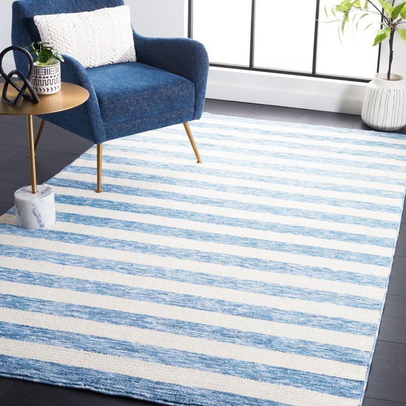 Light Blue and Ivory Striped Synthetic 4' x 6' Area Rug