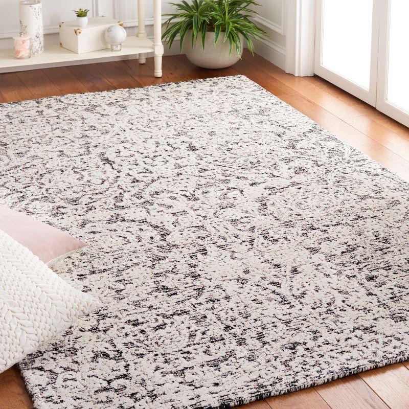 Metro MET879 Hand Tufted Area Rug  - Safavieh