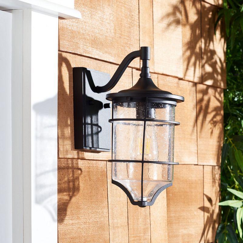 Rueda Bronze and Black Outdoor Wall Sconce Set