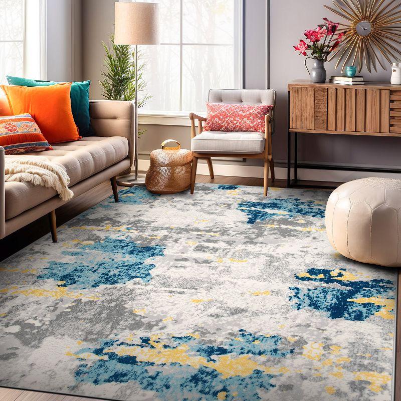 Cream and Blue Abstract Synthetic 5' x 7' Area Rug