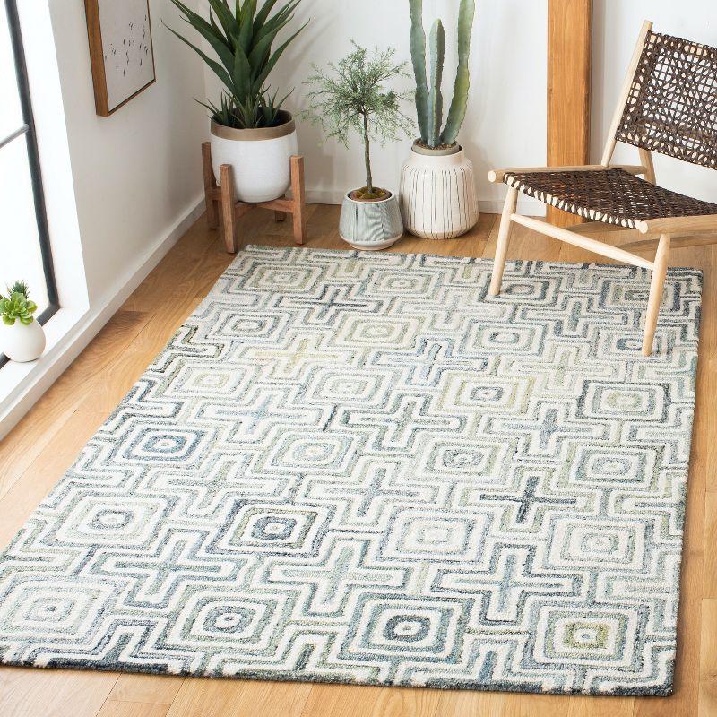 Ivory and Blue Geometric Hand-Tufted Wool Area Rug, 6' x 9'