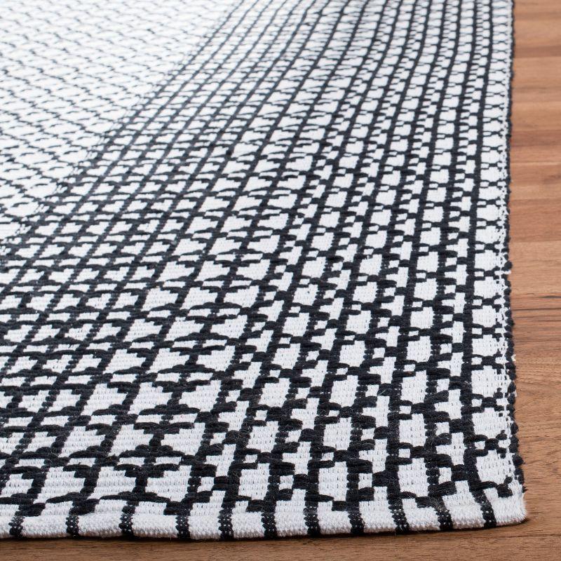 Ivory and Black Cotton Flat Woven Handmade Area Rug - 5' x 8'