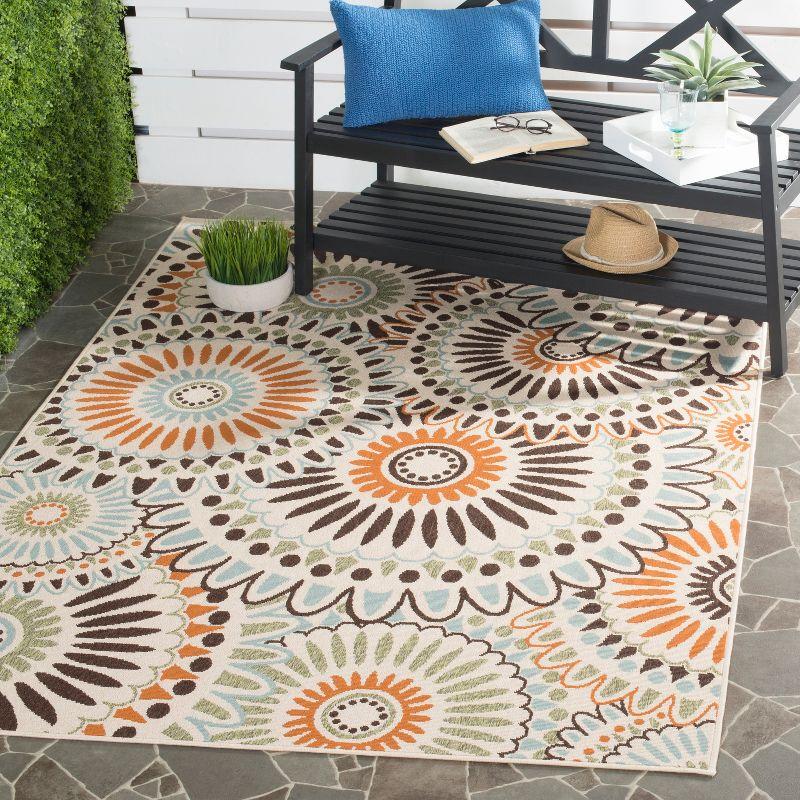 Cream and Chocolate Floral Synthetic Indoor/Outdoor Rug