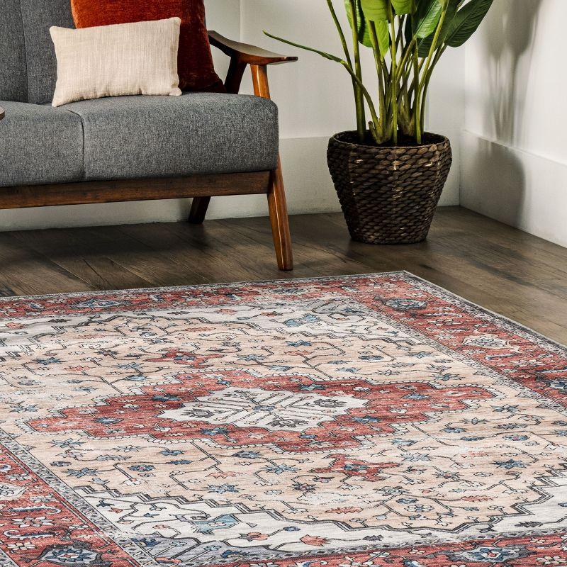 Ivory and Rust 4' x 6' Washable Synthetic Area Rug