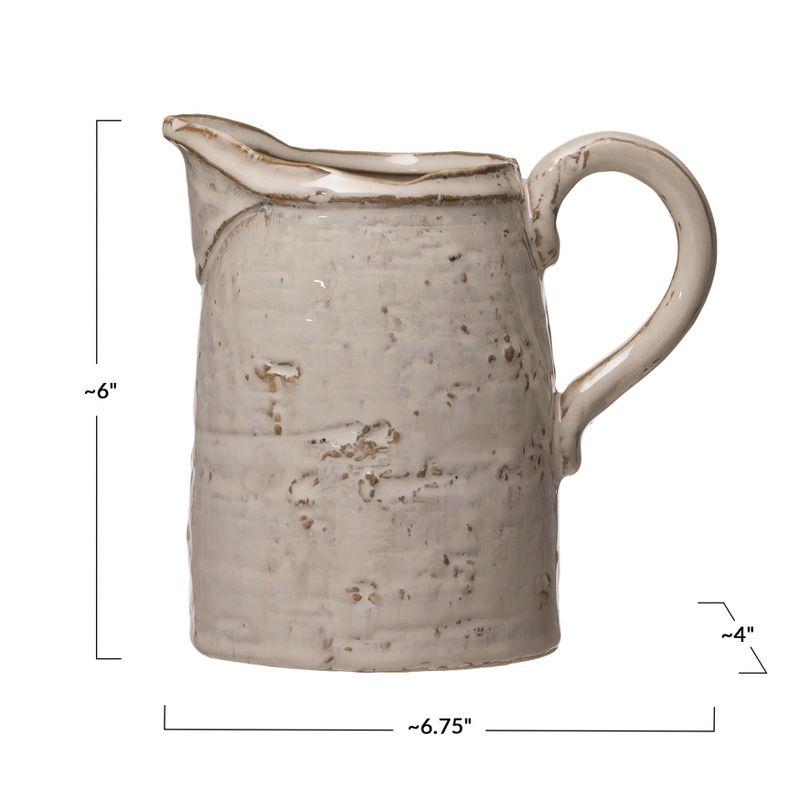 Storied Home 28 oz. Stoneware Pitcher, Reactive Glaze, White (Each One Will Vary)