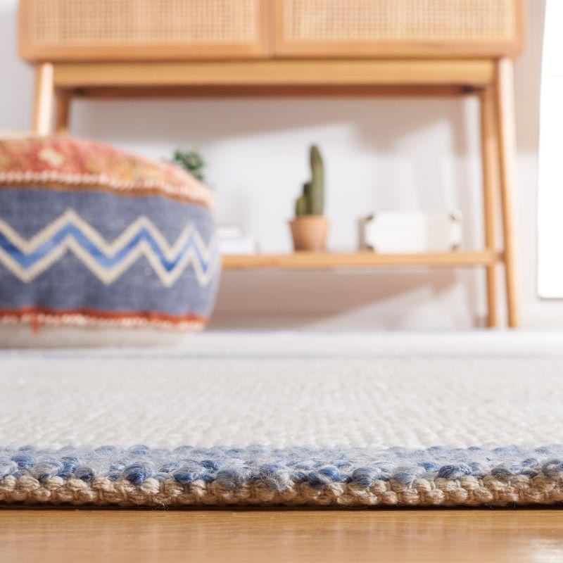 Ivory and Blue Handwoven Wool Area Rug 4' x 6'