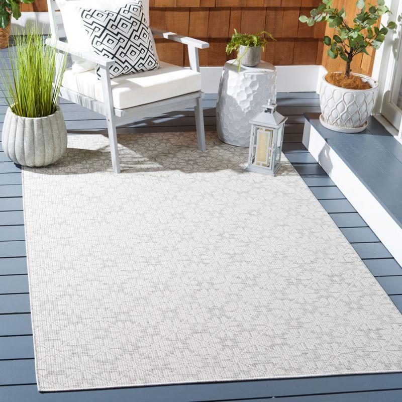 Grey and Ivory Square Tufted Synthetic Area Rug