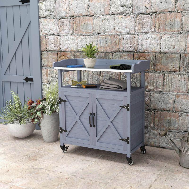 Outsunny Outdoor Potting Bench, Wooden Potting Table with Storage Cabinet, Aluminum Tabletop, Rubber Wheels for Backyard, Patio, Balcony, Gray