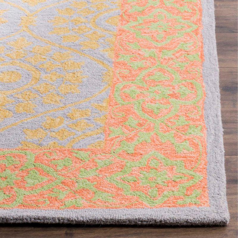 Handmade Orange and Silver Floral Wool Area Rug 3' x 5'