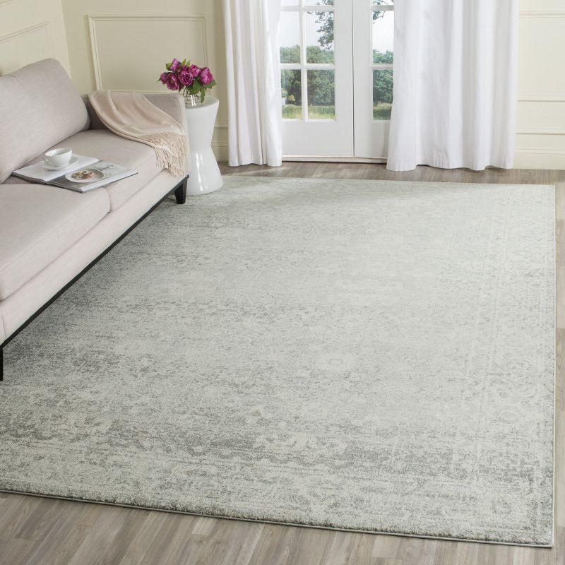 Silver and Ivory Rectangular Synthetic Area Rug