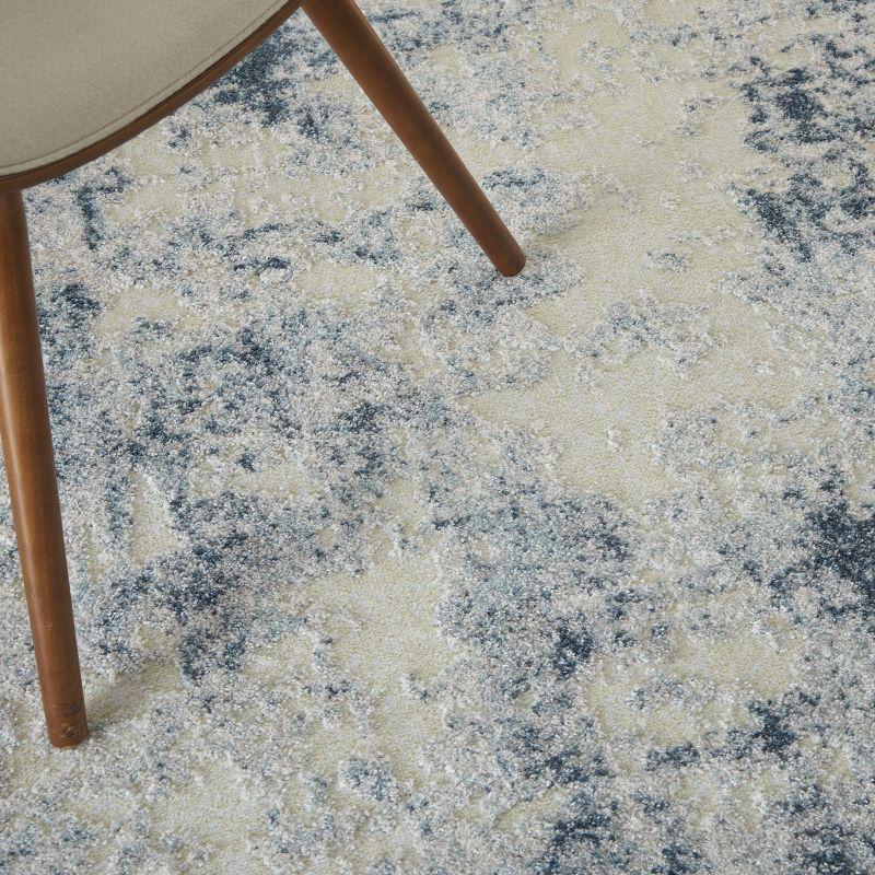 Ivory Blue Abstract 6'6" x 9'6" Area Rug