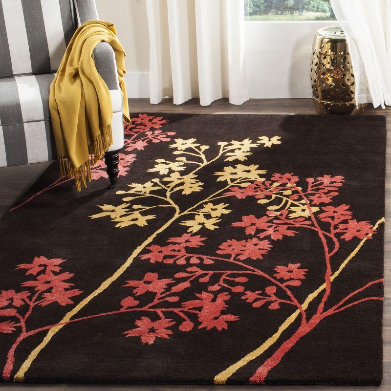 Handmade Brown and Red Floral Wool Area Rug