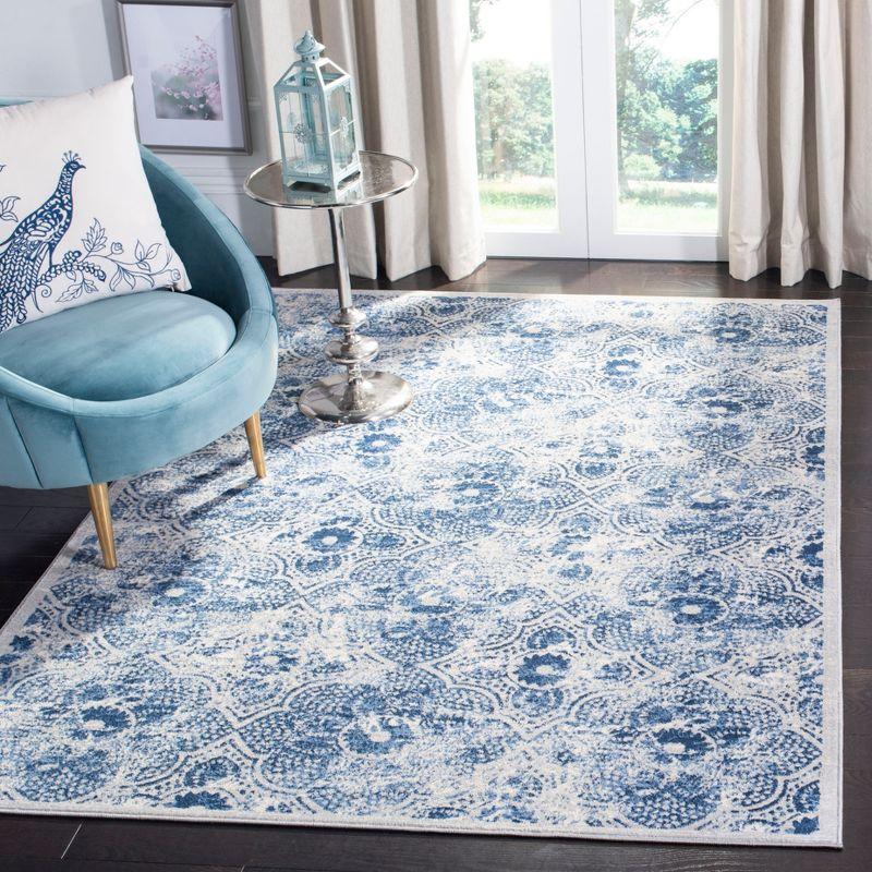 Cream and Blue Hand-Knotted Synthetic Area Rug