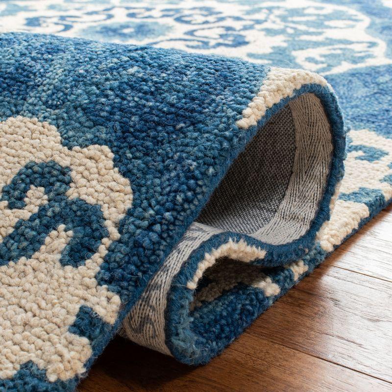 Roslyn ROS525 Hand Tufted Area Rug - Blue/Ivory - 6'x9' - Safavieh.