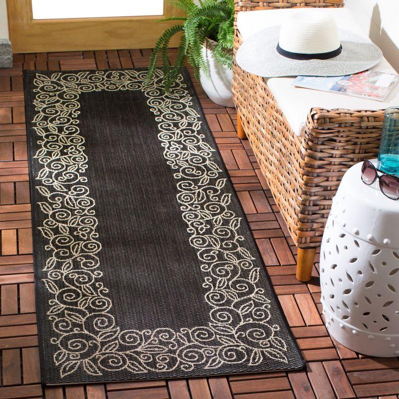 Black and Beige Floral Border Indoor/Outdoor Runner Rug