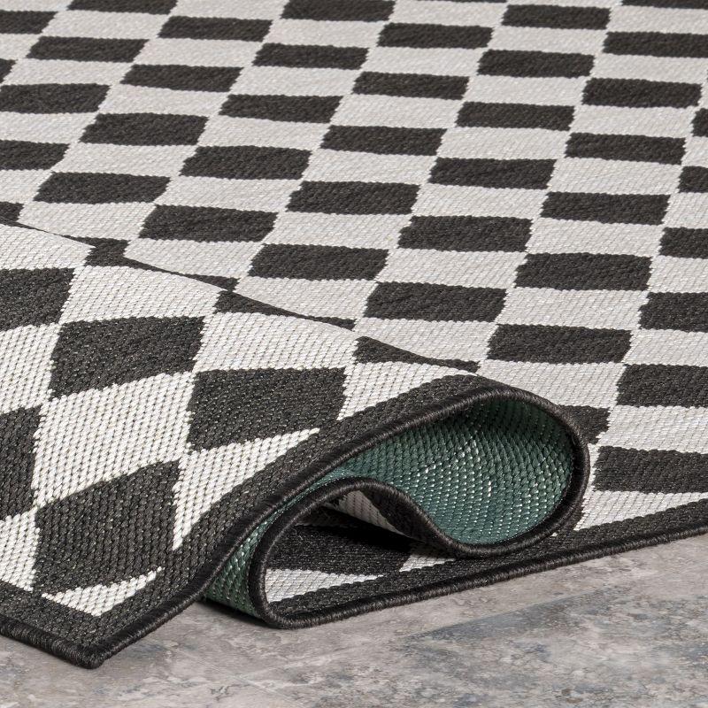 Regal Checkered Black and White Synthetic 5' x 8' Area Rug