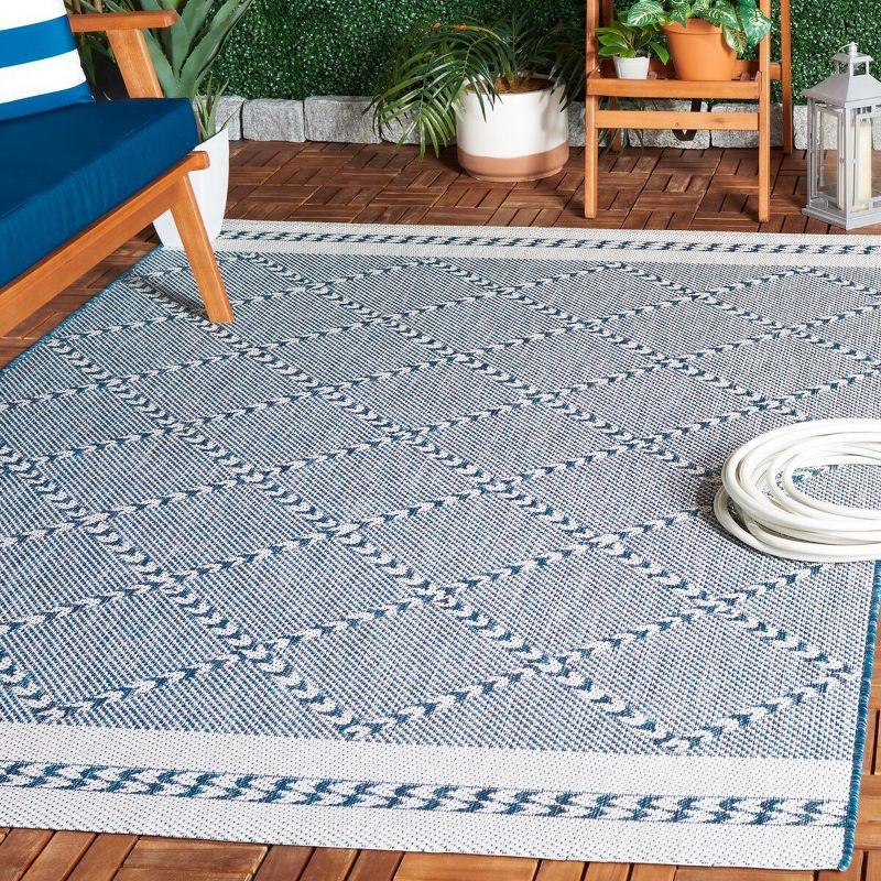 Navy and Ivory Rectangular Synthetic Area Rug