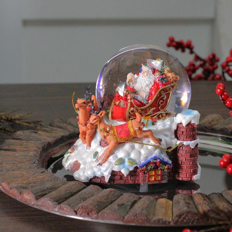 5.5" Santa on His Sleigh with Reindeer Musical Christmas Snow Globe