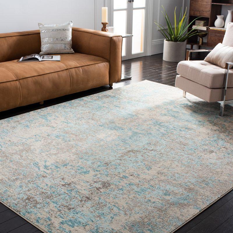 Ivory Synthetic 6' x 9' Hand-Knotted Easy Care Area Rug