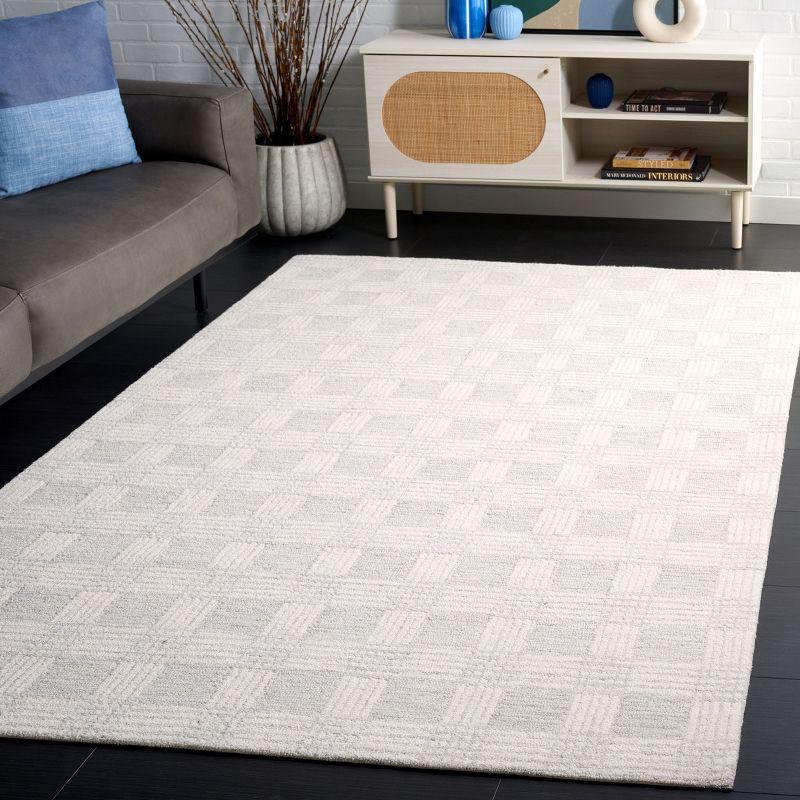 Ivory Tufted Handmade Wool Rectangular Area Rug 5' x 8'