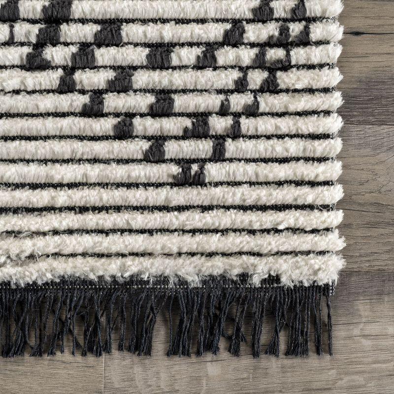 Beige and Ivory 4' x 6' Shag Area Rug with Fringe