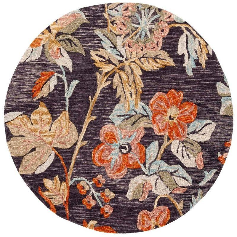 Handmade Round Floral Blue and Orange Wool Area Rug