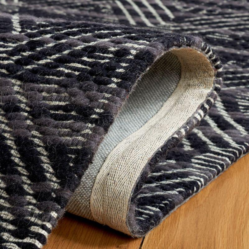 Marbella MRB451 Hand Loomed Area Rug - Black/Ivory - 6'x9' - Safavieh.