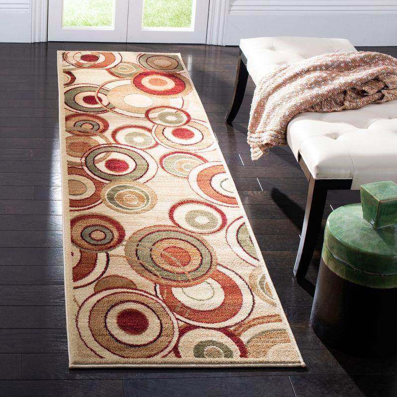 Ivory and Multi Synthetic Retro Rectangle Area Rug